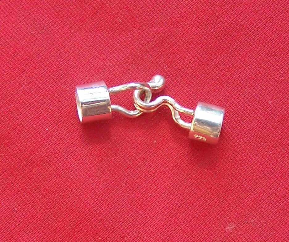 Clip on clasp. The clasp has been designed to "clip" when closing. This is a safety feature so that it cannot come loose. - LZK6