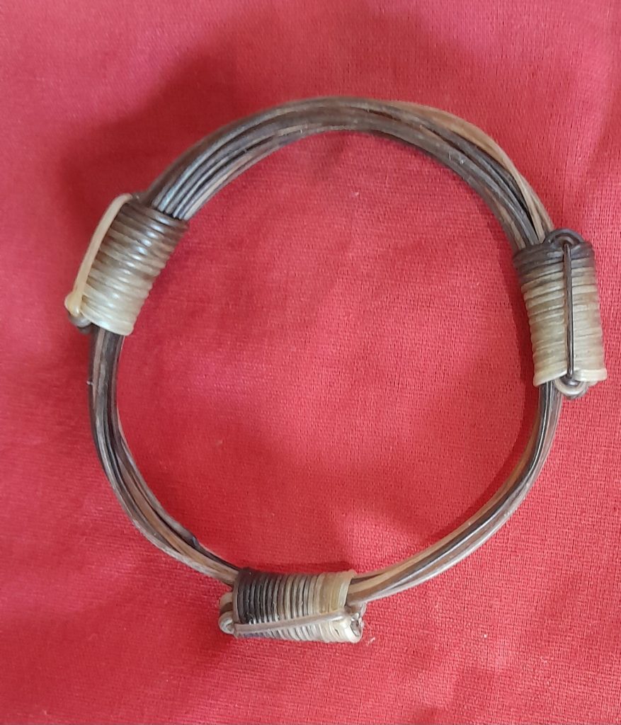 JEB18 White and Multi colored elephant hair bracelet 3.5" max diam