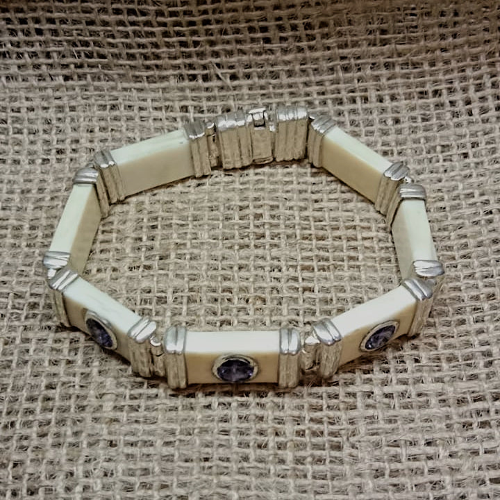 FC5 Hand crafted warthog tusk and Tanzanite