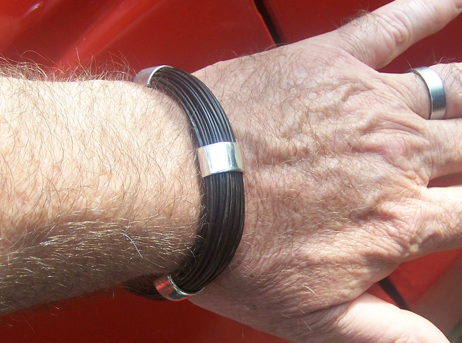 This HBS elephant hair bracelet is shown on it's creator's wrist, Francis Cary-Smith.