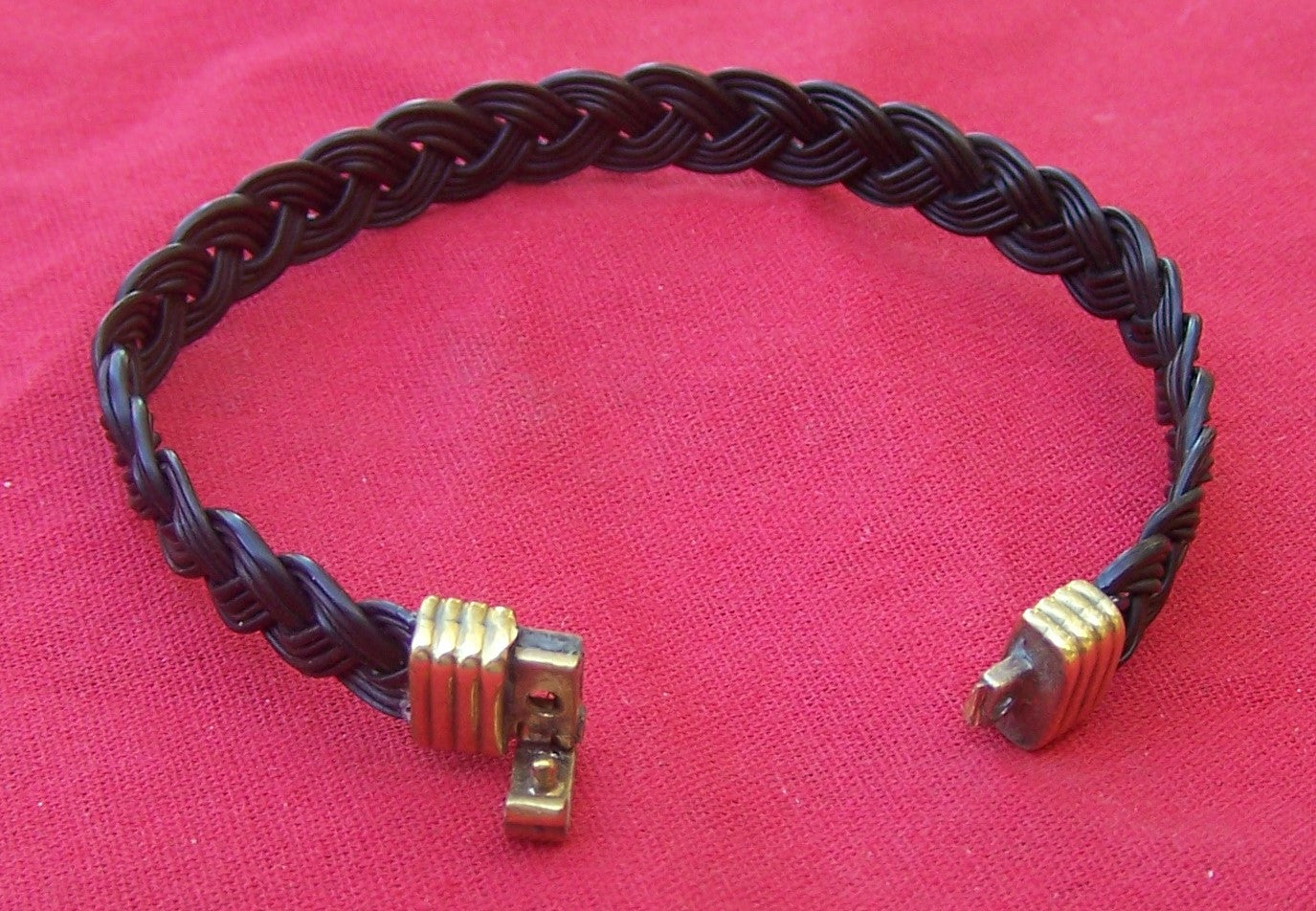 This unique brass clasp clicks closed to secure your bracelet in place. - JEPS
