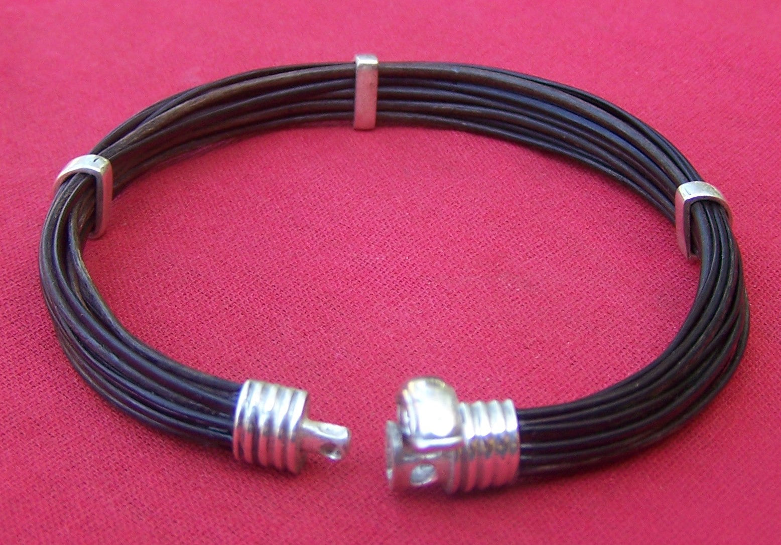 This sterling silver clasp clicks to close and secure the JEZA elephant hair bracelet to your wrist.