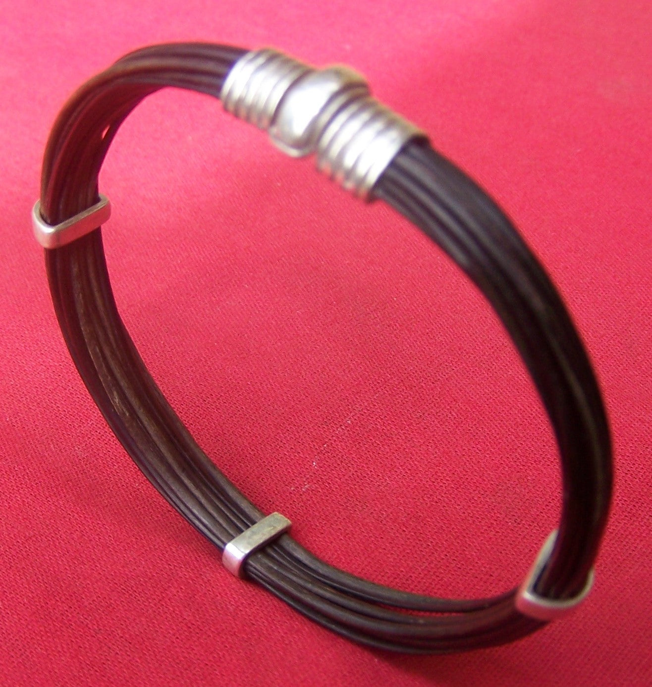 Plain dark elephant hair bracelet with sterling silver "click to close" clasp and sterling silver sliders. - JEJX
