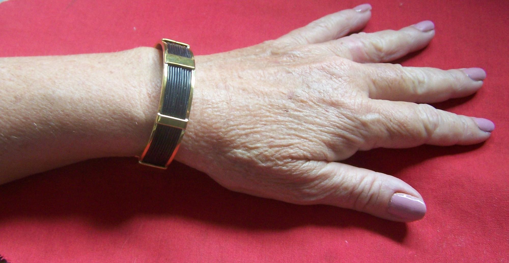 This is the Ladies' 3" size on a lady's wrist. Matches other golden jewellery beautifully. - LG