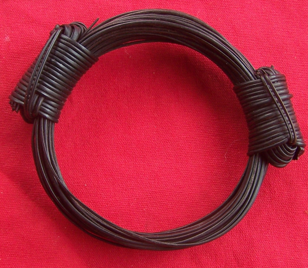 Distinctive traditional bracelet.  30 strands of hair with 2 sliding knots. Made with high quality dark hair. - JED4