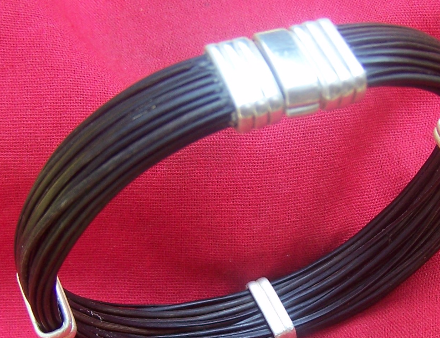 Sparkling sterling silver complete the design of this elephant hair bracelet. - JJ85